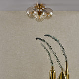 Ulrika 3 Light Flush Antique Brass and Amber Glass