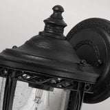 Charming Black Wall Lantern with Seeded Glass Panels