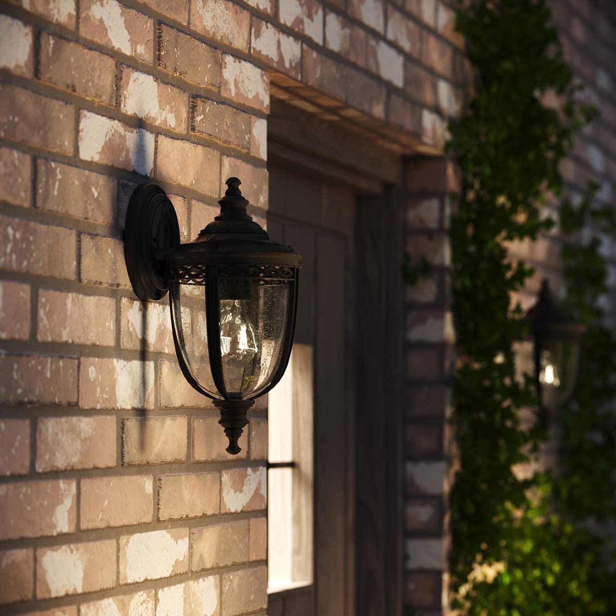 Charming Black Wall Lantern with Seeded Glass Panels
