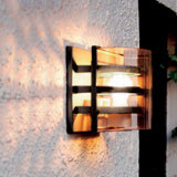 Graphite Elegance: Delta Wall Light with Modern Criss-Cross Design