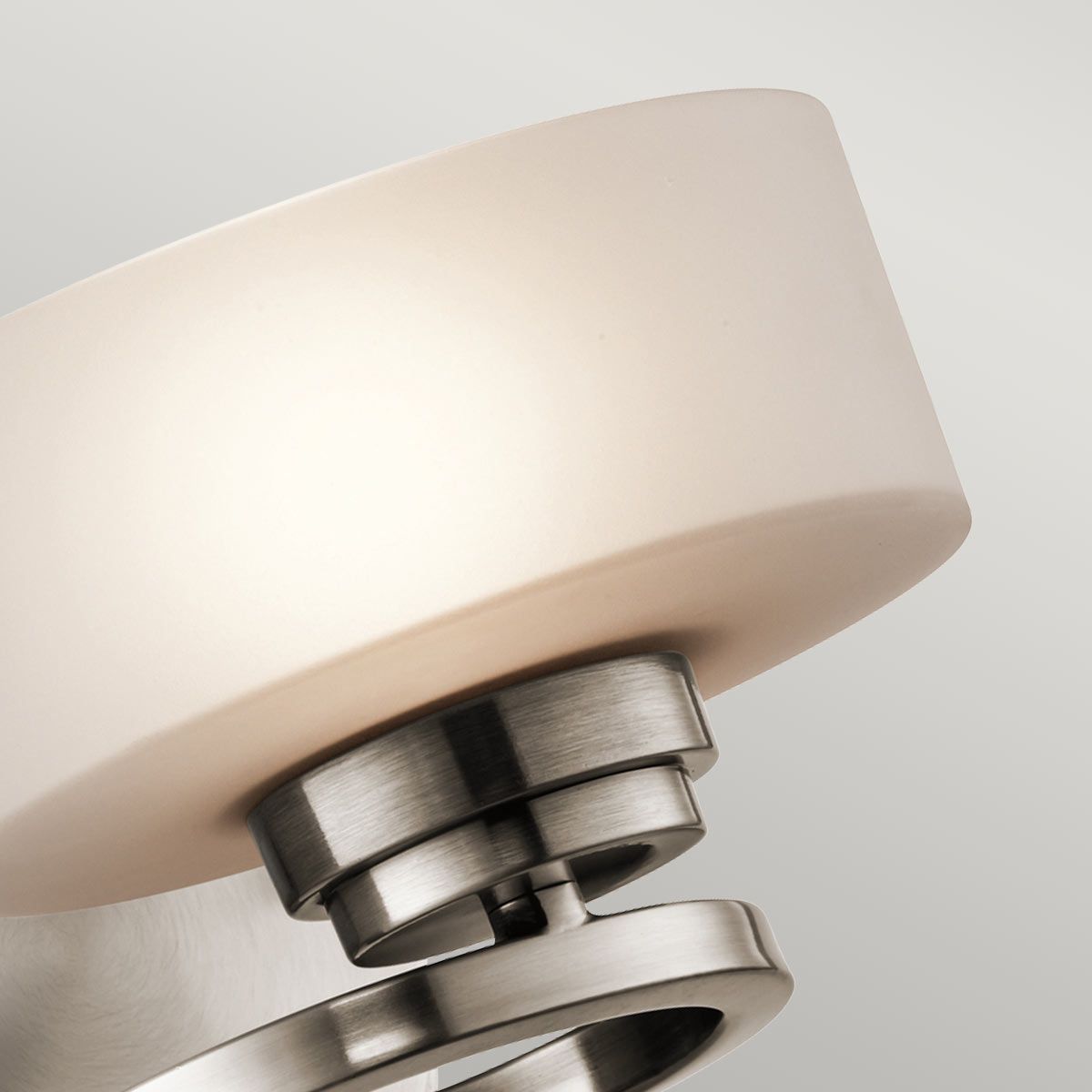 Aleeka Contemporary Pewter Wall Sconce with Frosted Glass Globe