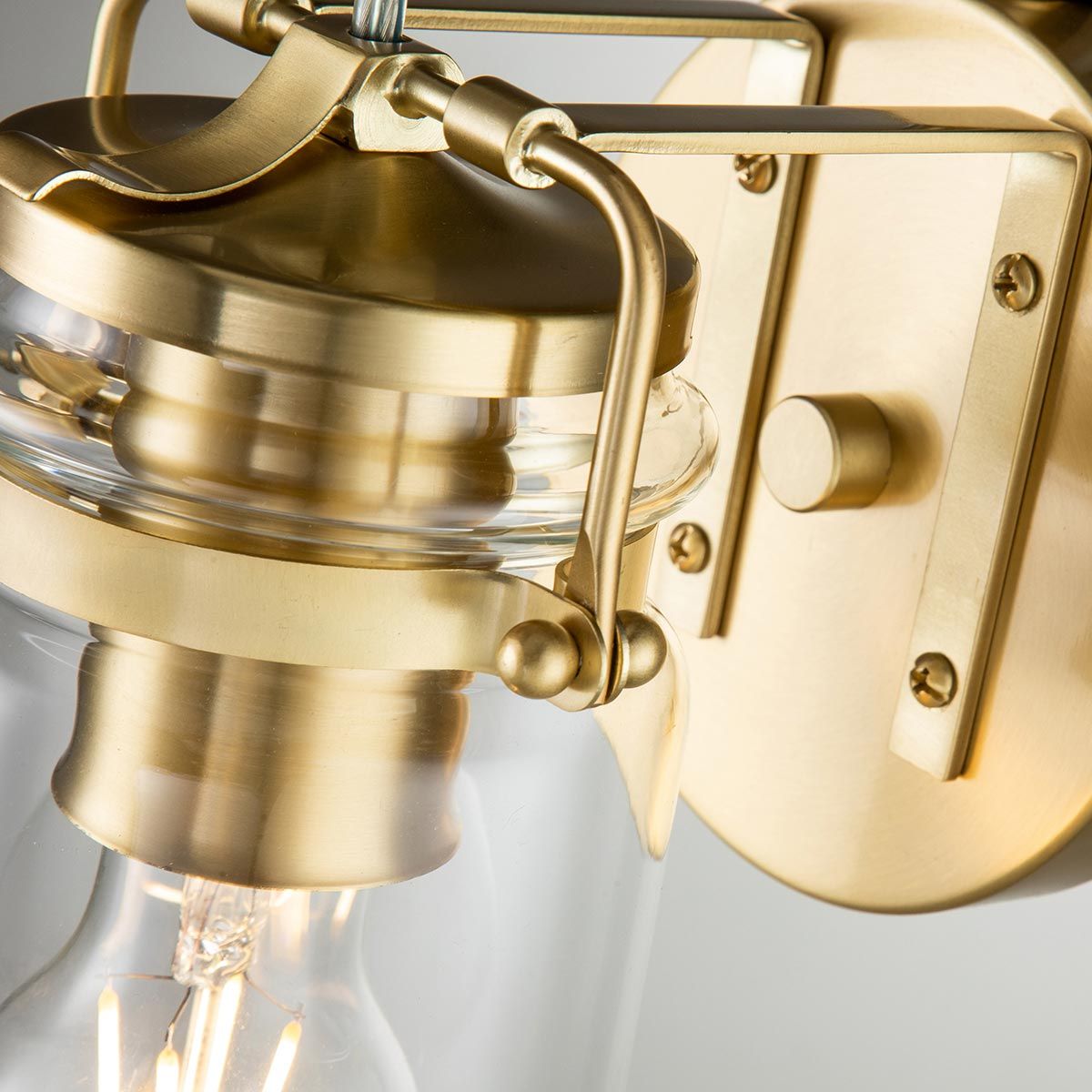 Brinley Vintage Brushed Brass Wall Light with Clear Glass Shade