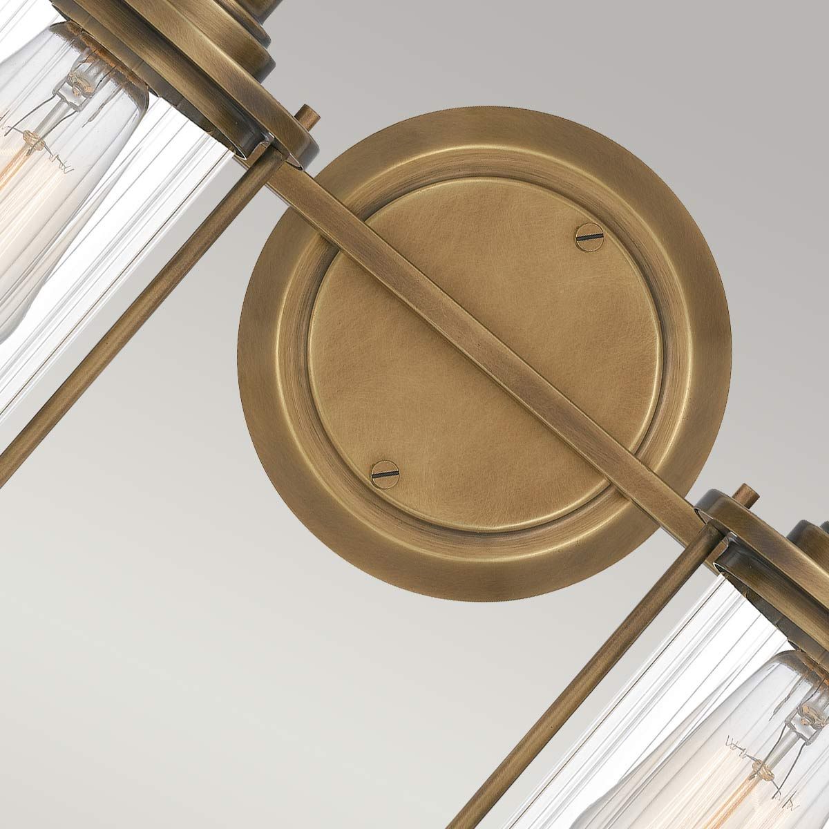 Riggs Dual-Light Industrial Wall Fixture in Weathered Brass